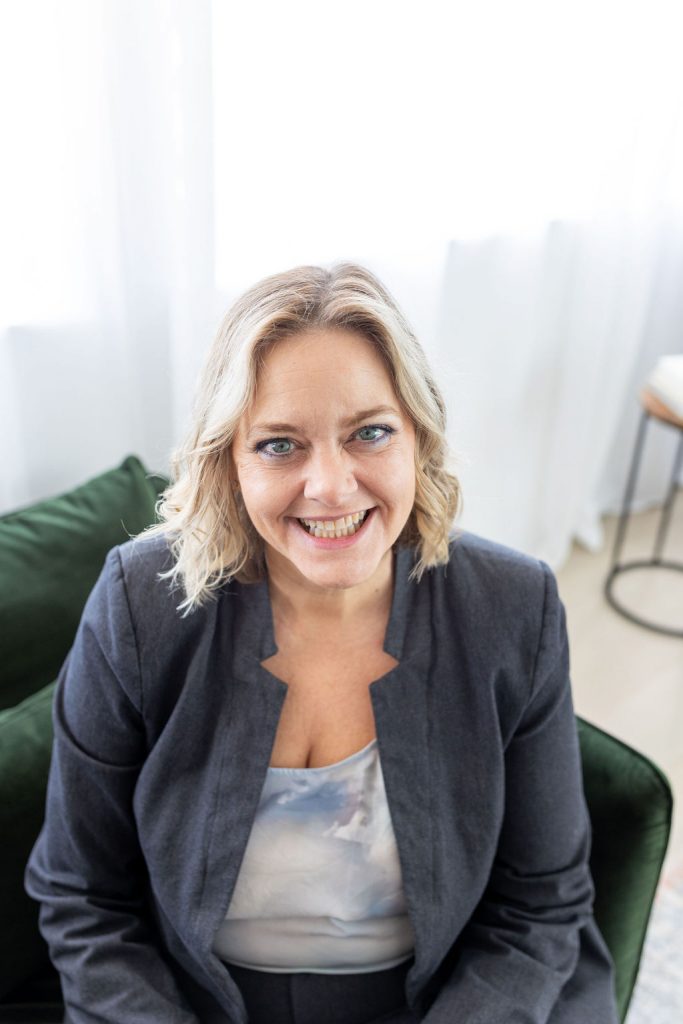 Photo of Michelle Puffer, President & CEO, smiling at camera.
Photo by Robyn Strong Photography